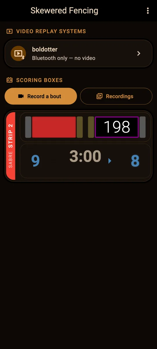 the app home screen listing a video replay system found over Bluetooth above a scoring box